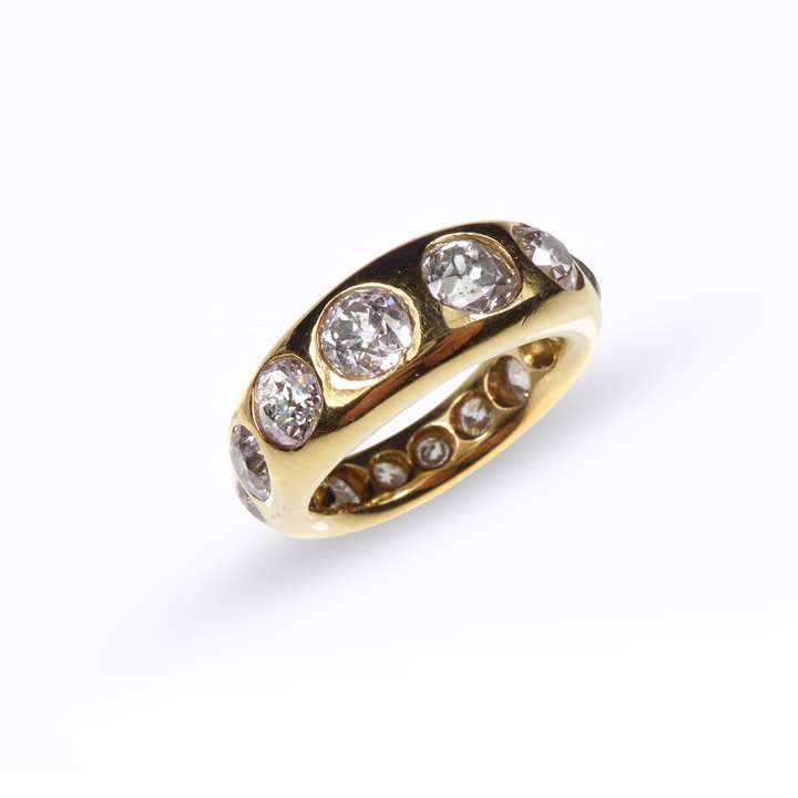 Cushion diamond and gold full eternity ring